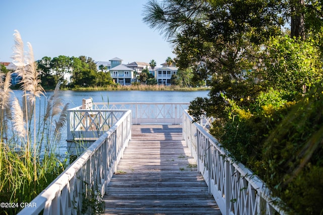 dock area featuring a water view