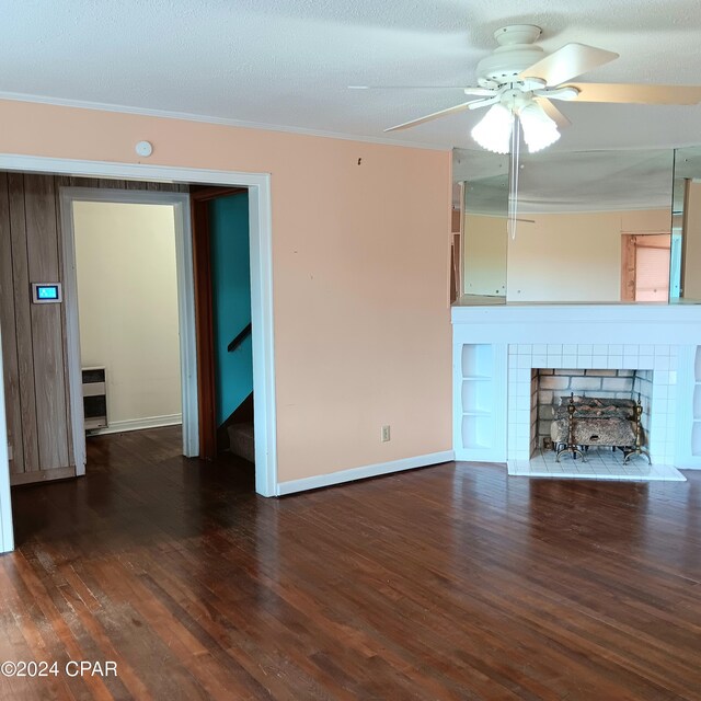 326 Massalina Dr, Panama City, FL 32401 - unfurnished living room with baseboards, a ceiling fan, wood finished floors, and crown molding