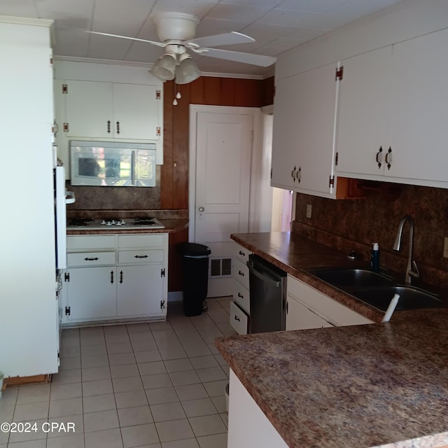 kitchen with ceiling fan, sink, white cabinets, and appliances with stainless steel finishes