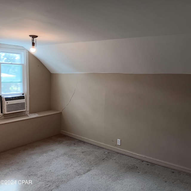 bonus room with light colored carpet, cooling unit, and lofted ceiling