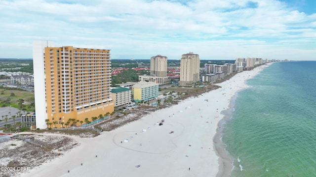 aerial view with a view of the beach and a water view