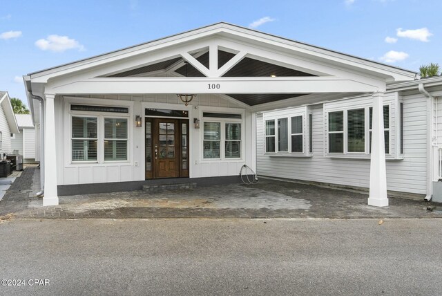 property entrance with central air condition unit