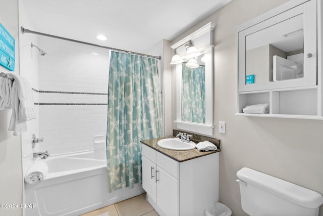 full bathroom with tile patterned floors, vanity, toilet, and shower / bathtub combination with curtain