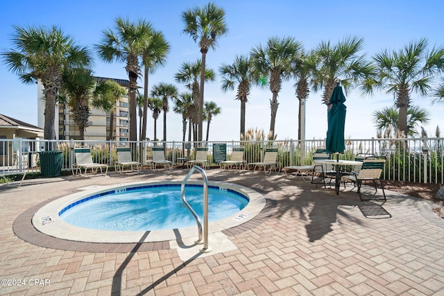 view of swimming pool with a patio