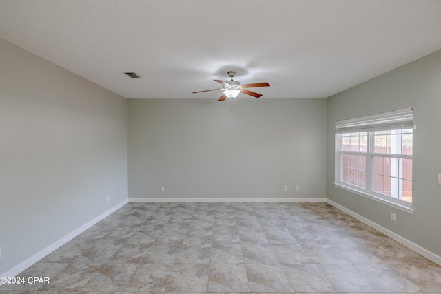 empty room with ceiling fan