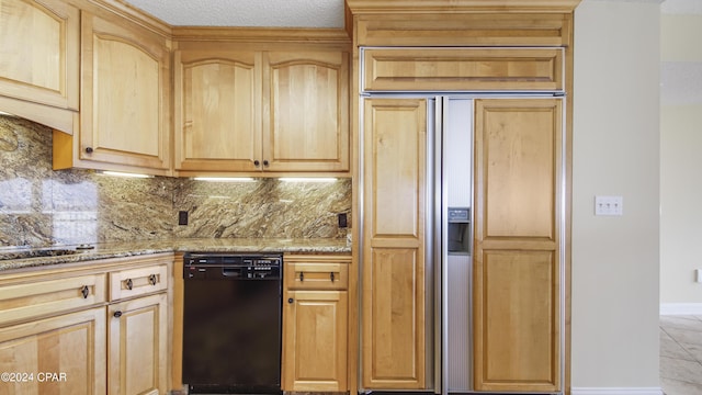 kitchen featuring decorative backsplash, light brown cabinets, light stone countertops, and black dishwasher