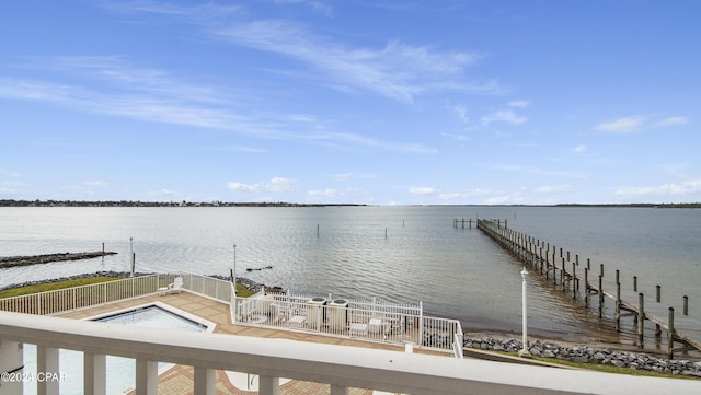 dock area with a water view