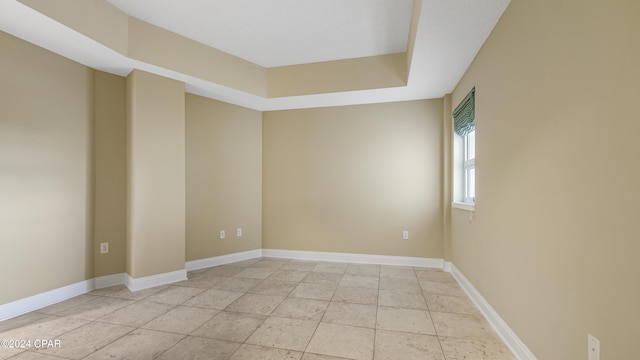 empty room featuring light tile patterned floors