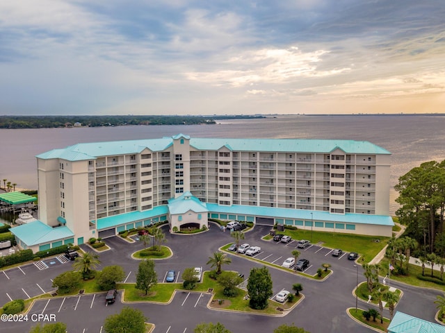 birds eye view of property featuring a water view