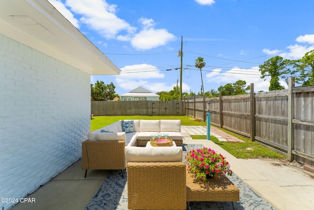 view of patio / terrace with a fenced backyard and outdoor lounge area