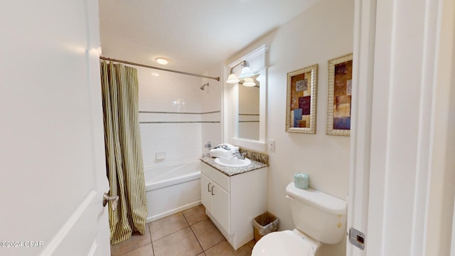 full bathroom featuring tile patterned floors, vanity, shower / bath combo, and toilet