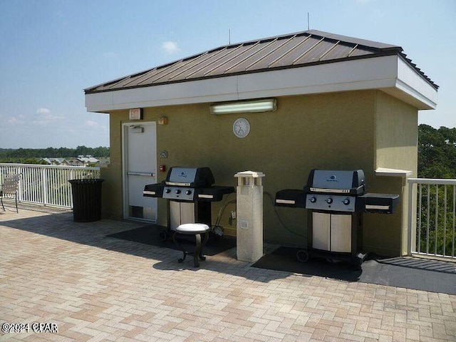 view of patio / terrace with a grill