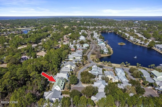 bird's eye view with a water view