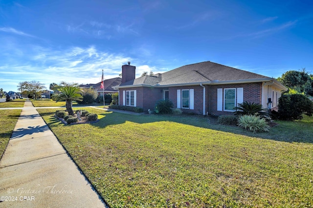 ranch-style house with a front yard