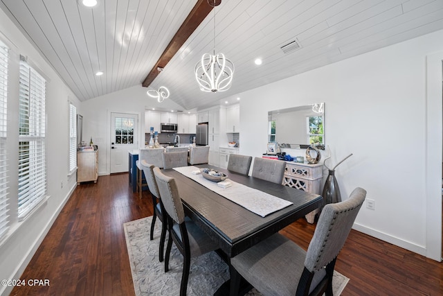 dining area with vaulted ceiling with beams, recessed lighting, a notable chandelier, dark wood-type flooring, and baseboards