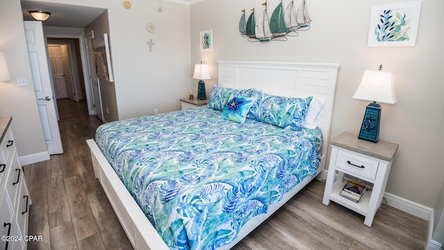 bedroom with wood-type flooring