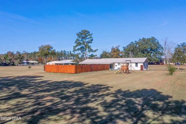 view of yard featuring a playground