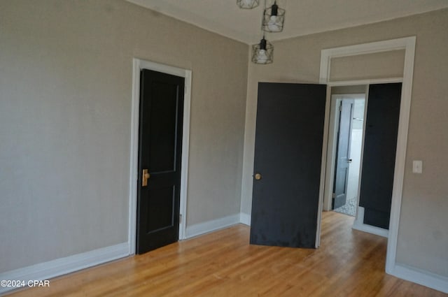 empty room featuring hardwood / wood-style flooring