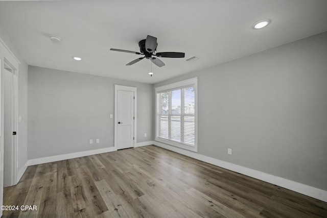 unfurnished bedroom with light hardwood / wood-style flooring and ceiling fan