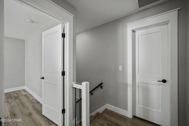 hallway with light wood-type flooring