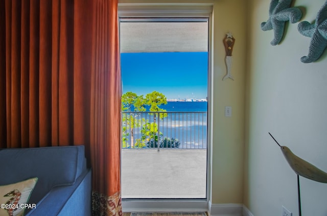 doorway featuring a water view