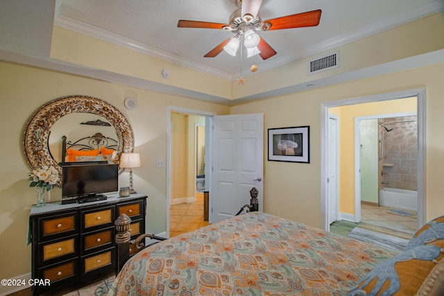 tiled bedroom with ceiling fan, ornamental molding, and ensuite bathroom