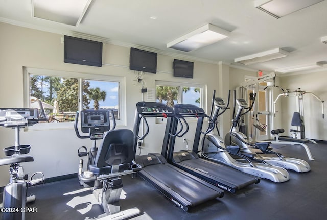 exercise room with ornamental molding