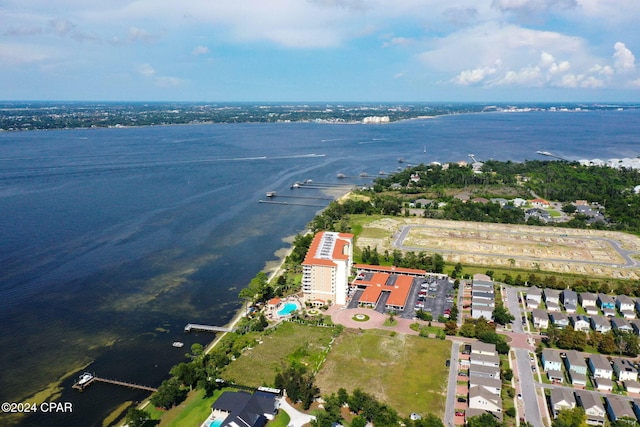 drone / aerial view featuring a water view