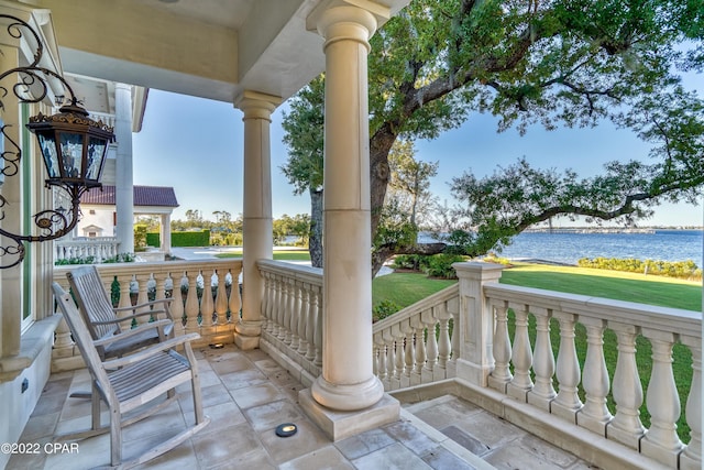 3730 Preserve Bay Blvd, Panama City, FL 32408 - view of patio featuring a porch and a water view