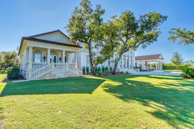 3730 Preserve Bay Blvd, Panama City, FL 32408 - view of front of home featuring covered porch and a front yard