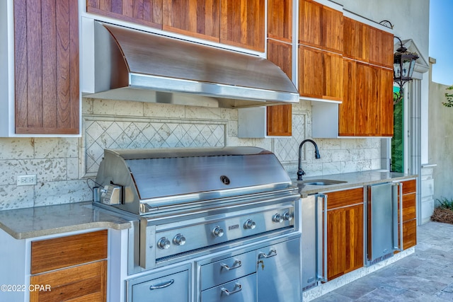 3730 Preserve Bay Blvd, Panama City, FL 32408 - kitchen with backsplash, stainless steel refrigerator, sink, and extractor fan