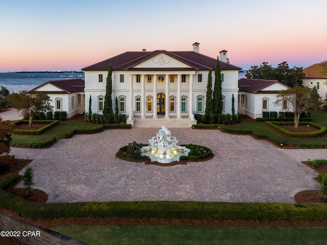 3730 Preserve Bay Blvd, Panama City, FL 32408 - back house at dusk with covered porch