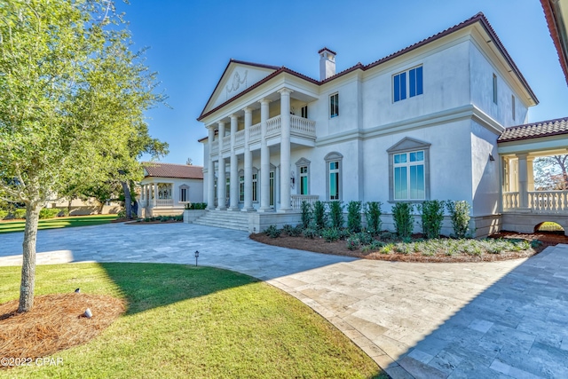 3730 Preserve Bay Blvd, Panama City, FL 32408 - rear view of house with a lawn and a balcony