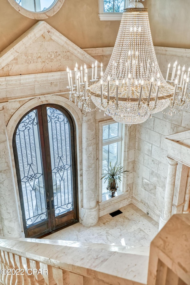 3730 Preserve Bay Blvd, Panama City, FL 32408 - entrance foyer with an inviting chandelier and french doors