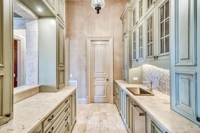 3730 Preserve Bay Blvd, Panama City, FL 32408 - kitchen with cream cabinets, light stone countertops, and sink