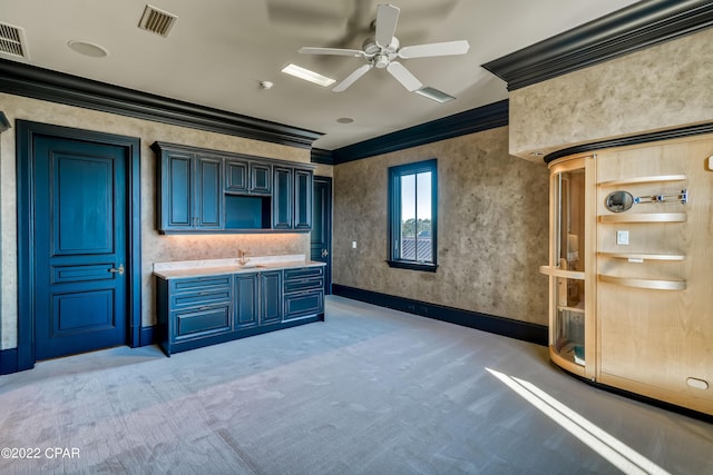 3730 Preserve Bay Blvd, Panama City, FL 32408 - bar with ceiling fan, sink, blue cabinets, crown molding, and light carpet
