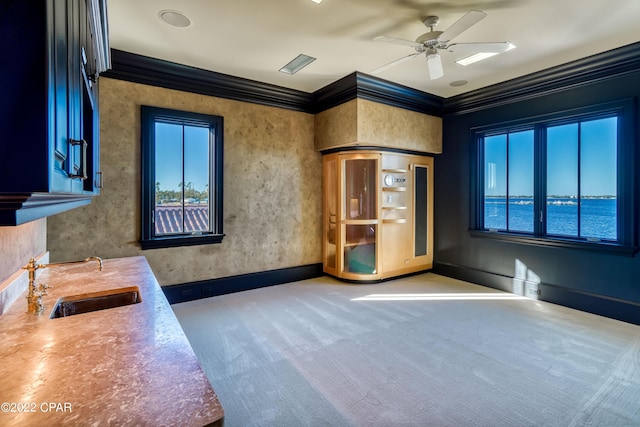 3730 Preserve Bay Blvd, Panama City, FL 32408 - interior space featuring ceiling fan, sink, a water view, and ornamental molding
