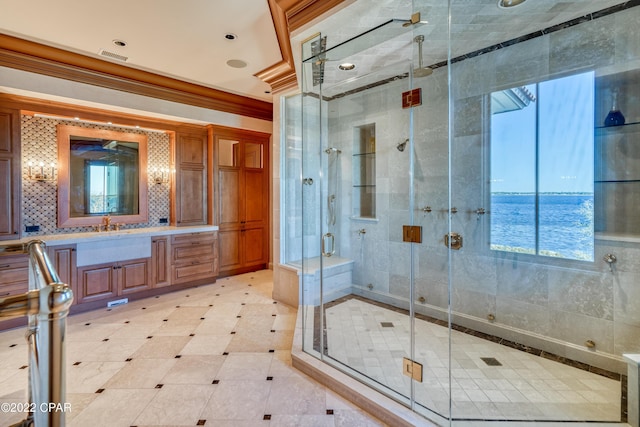 3730 Preserve Bay Blvd, Panama City, FL 32408 - bathroom with a water view, crown molding, a shower with door, and vanity