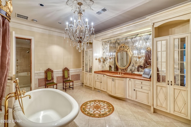 3730 Preserve Bay Blvd, Panama City, FL 32408 - bathroom with tile patterned flooring, french doors, vanity, and ornamental molding