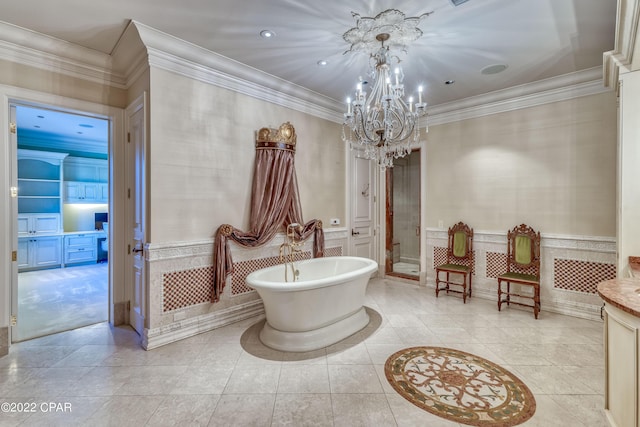 3730 Preserve Bay Blvd, Panama City, FL 32408 - bathroom featuring built in shelves, a bath, a notable chandelier, tile patterned floors, and ornamental molding