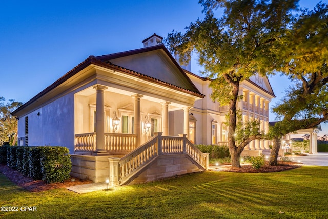 3730 Preserve Bay Blvd, Panama City, FL 32408 - view of front facade with covered porch and a lawn