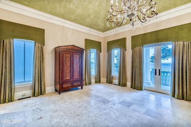 3730 Preserve Bay Blvd, Panama City, FL 32408 - foyer featuring crown molding, french doors, a chandelier, and a high ceiling
