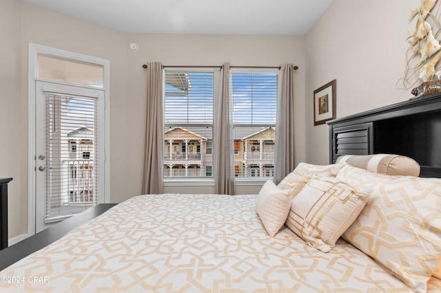 bedroom featuring multiple windows