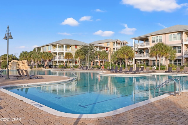 view of swimming pool featuring a patio