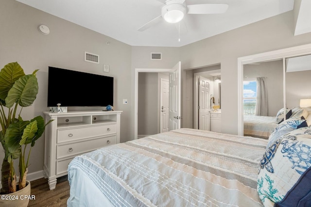 bedroom with ceiling fan and dark wood-type flooring