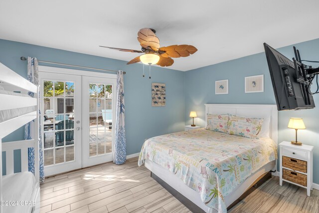 bedroom with ceiling fan, access to exterior, light hardwood / wood-style flooring, and french doors