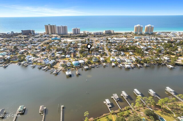 drone / aerial view with a water view