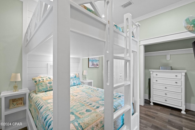 bedroom featuring dark wood-type flooring