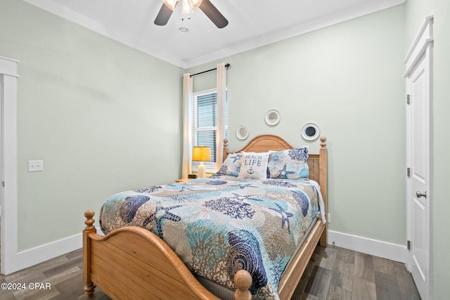 bedroom with ceiling fan and hardwood / wood-style floors