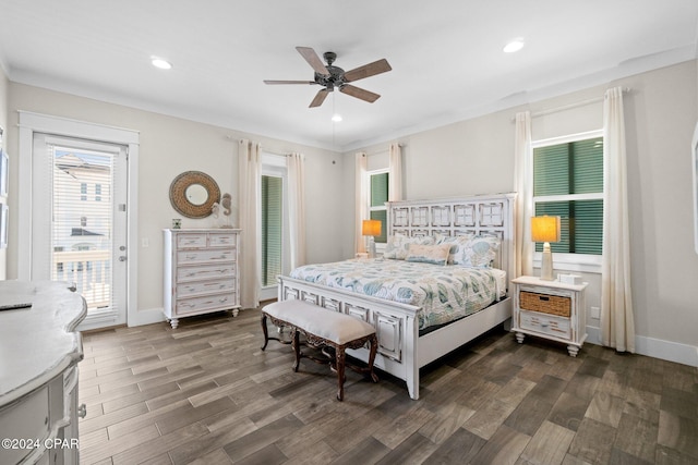 bedroom featuring access to exterior, dark hardwood / wood-style flooring, ceiling fan, and crown molding